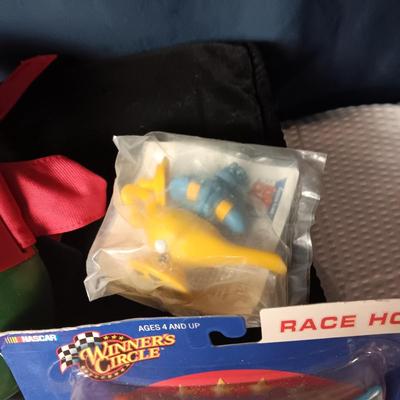 A BOX WITH A VARIETY OF TOYS