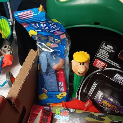 A BOX WITH A VARIETY OF TOYS