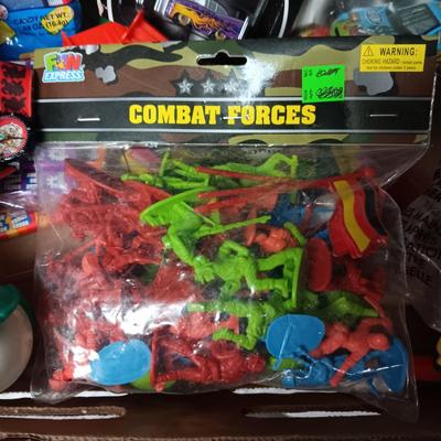 A BOX WITH A VARIETY OF TOYS