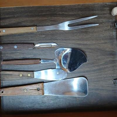 Drawer of wooden handled Kitchen utensils and Knives