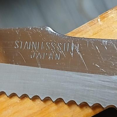 Drawer of wooden handled Kitchen utensils and Knives