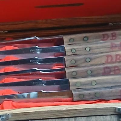 Drawer of wooden handled Kitchen utensils and Knives