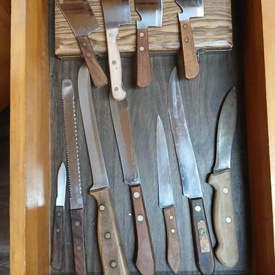 Drawer of wooden handled Kitchen utensils and Knives