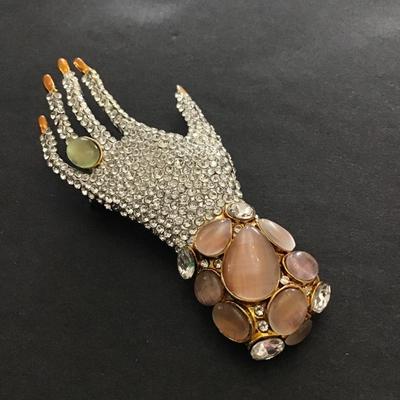 Really cool rhinestone hand brooch