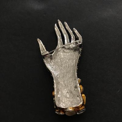 Really cool rhinestone hand brooch
