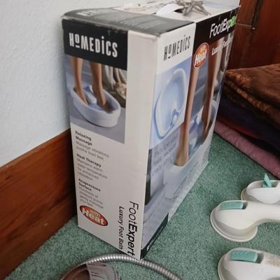 Assortment of Bath items - Towels - Foot expert foot bath - grooming items - suction handles and more