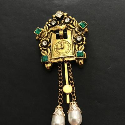 Cute gold tone clock brooch