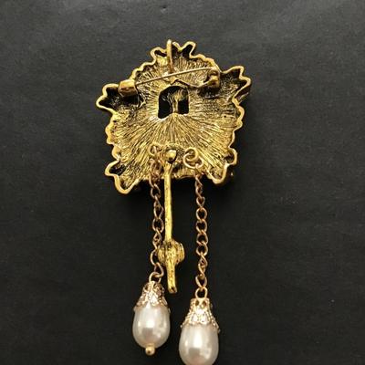 Cute gold tone clock brooch