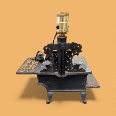 Sale Photo Thumbnail #58: Vintage Miniature Crescent Cast Iron Stove table Lamp.  tested Working