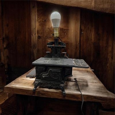 Sale Photo Thumbnail #60: Vintage Miniature Crescent Cast Iron Stove table Lamp.  tested Working