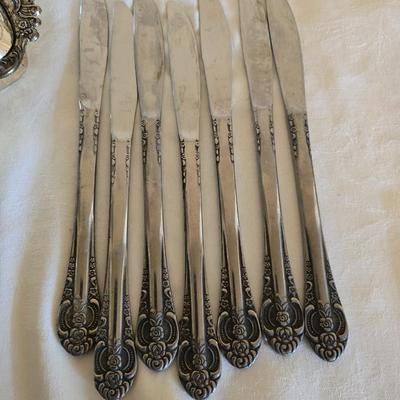 National stainless Japan flatware set - cream pitcher - candle sticks by Avon - and a beautiful metal covered butter dish