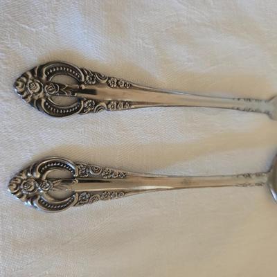 National stainless Japan flatware set - cream pitcher - candle sticks by Avon - and a beautiful metal covered butter dish