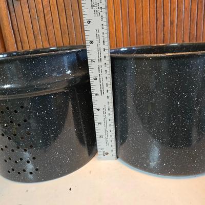 Two vintage speckled enamel stock pots with lids - small one has a strainer