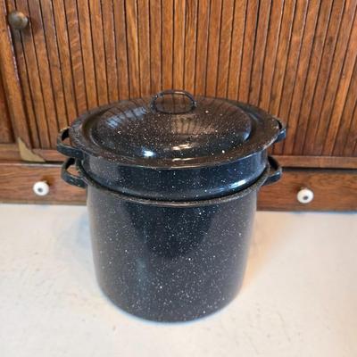 Two vintage speckled enamel stock pots with lids - small one has a strainer