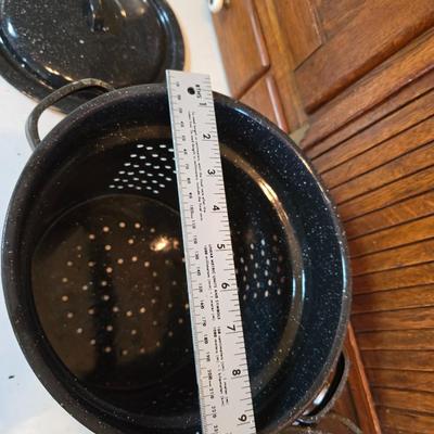 Two vintage speckled enamel stock pots with lids - small one has a strainer