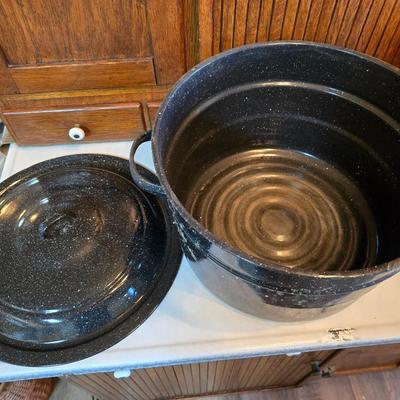 Two vintage speckled enamel stock pots with lids - small one has a strainer
