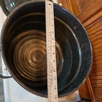 Two vintage speckled enamel stock pots with lids - small one has a strainer