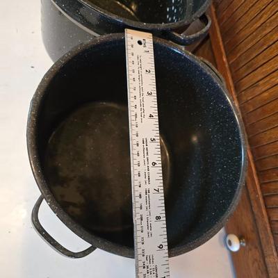 Two vintage speckled enamel stock pots with lids - small one has a strainer