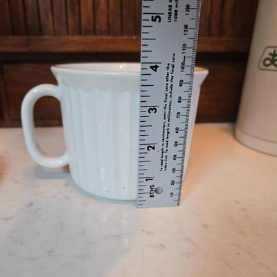 Philips Senseo coffee pod machine. - large white mug and a vintage Pioneer Seed advertising vacuum carafe