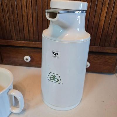 Philips Senseo coffee pod machine. - large white mug and a vintage Pioneer Seed advertising vacuum carafe