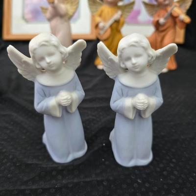 Angel figures with two framed Anne Geddes framed wall art pictures