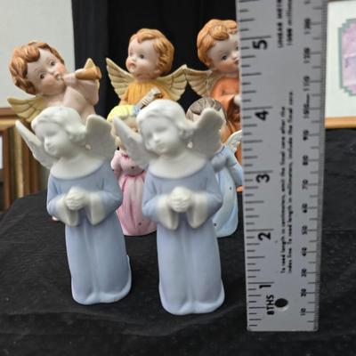 Angel figures with two framed Anne Geddes framed wall art pictures