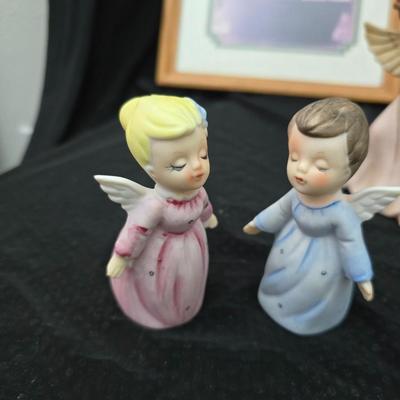 Angel figures with two framed Anne Geddes framed wall art pictures