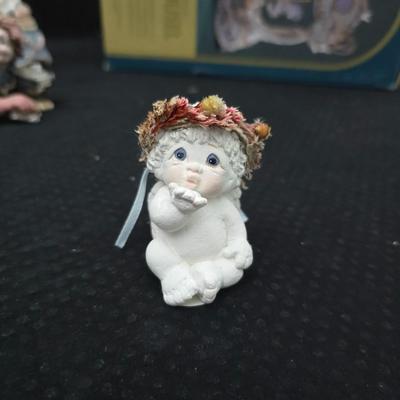 New in box Classic Treasures Musical Animated Carousel music box with a collection of angels