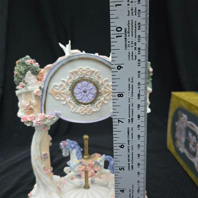 New in box Classic Treasures Musical Animated Carousel music box with a collection of angels