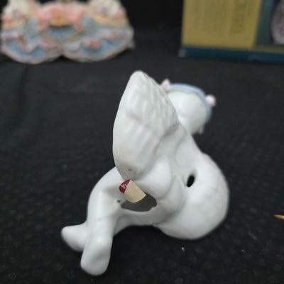 New in box Classic Treasures Musical Animated Carousel music box with a collection of angels