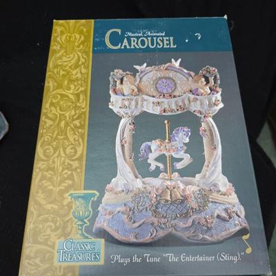 New in box Classic Treasures Musical Animated Carousel music box with a collection of angels