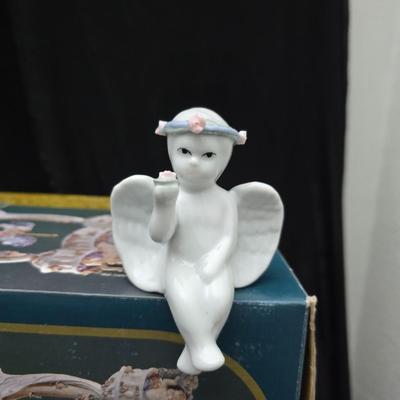 New in box Classic Treasures Musical Animated Carousel music box with a collection of angels