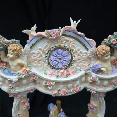 New in box Classic Treasures Musical Animated Carousel music box with a collection of angels