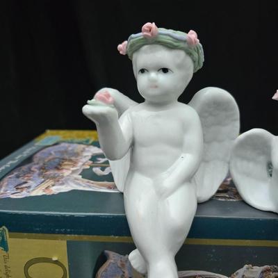 New in box Classic Treasures Musical Animated Carousel music box with a collection of angels