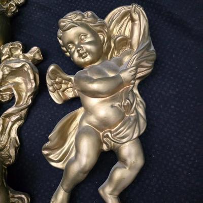 Homco Dart wall sconce with a smoked mirror and a gold-toned plastic frame. with angels - gold cherub or putto.wall art and vintage gold...