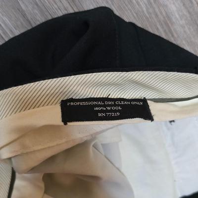 Five pair of Men's slacks - 2 are Levi brand - see pictures for sizes