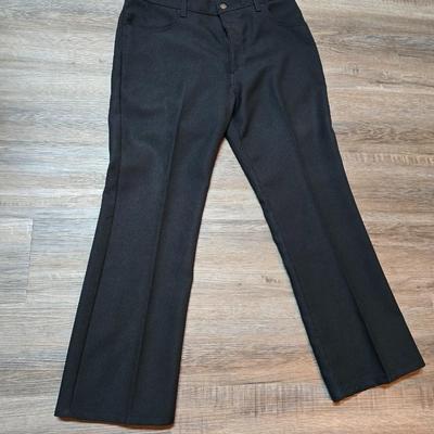 Five pair of Men's slacks - 2 are Levi brand - see pictures for sizes