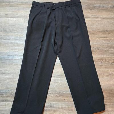 Five pair of Men's slacks - 2 are Levi brand - see pictures for sizes