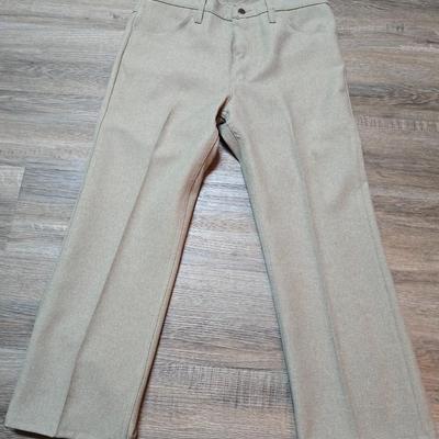Seven pairs of Men's Wrangler brand slacks - see pictures for all sizes