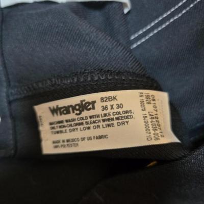 Seven pairs of Men's Wrangler brand slacks - see pictures for all sizes