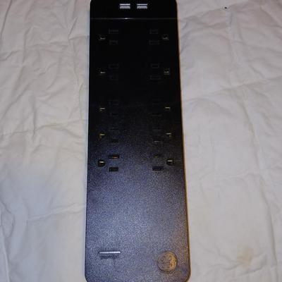 Stepstool with small tools and a box of assorted cords and a nice power supply usb box