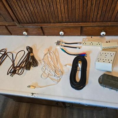 Stepstool with small tools and a box of assorted cords and a nice power supply usb box