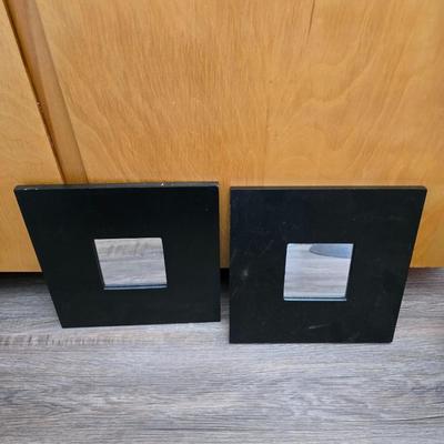 Barometer - Civil war VHS tapes - Two wall mirror accent pieces - and an assortment of other items that didn't get placed in lots.