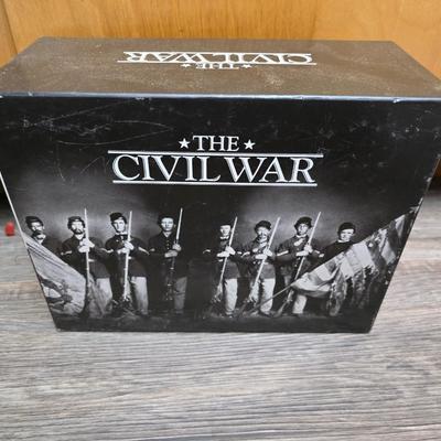 Barometer - Civil war VHS tapes - Two wall mirror accent pieces - and an assortment of other items that didn't get placed in lots.