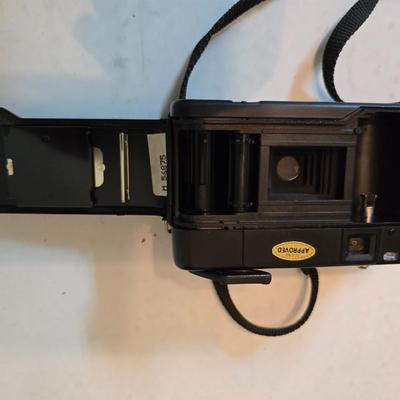 Yashica Auto Focus S 35mm point-and-shoot film camera with an assortment of vintage Sylvania Flashbars and Flashcubes for specific...