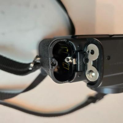 Yashica Auto Focus S 35mm point-and-shoot film camera with an assortment of vintage Sylvania Flashbars and Flashcubes for specific...