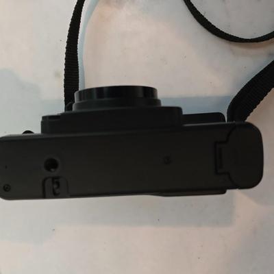 Yashica Auto Focus S 35mm point-and-shoot film camera with an assortment of vintage Sylvania Flashbars and Flashcubes for specific...