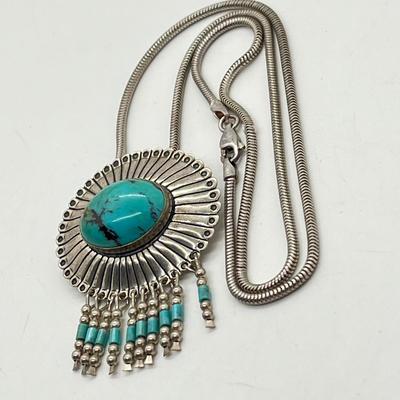 LOT 45: Sterling Silver Native American Turquoise Pendant on 17" Necklace - 15.4 GTW
