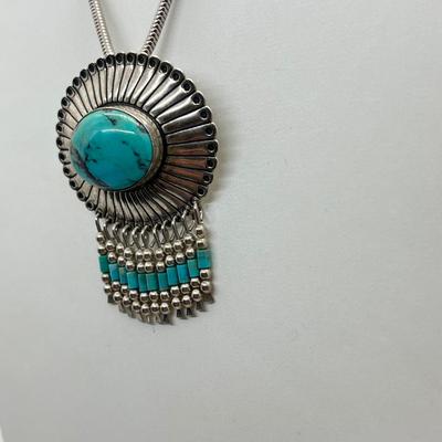 LOT 45: Sterling Silver Native American Turquoise Pendant on 17" Necklace - 15.4 GTW