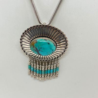 LOT 45: Sterling Silver Native American Turquoise Pendant on 17" Necklace - 15.4 GTW